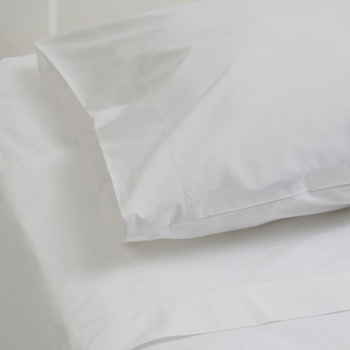 Huddleson hemstitched cotton sheets. 500 thread count percale sheet set. Crisp, cool long-staple cotton woven in Italy, sewn and finished with an elegant hemstitch in US.