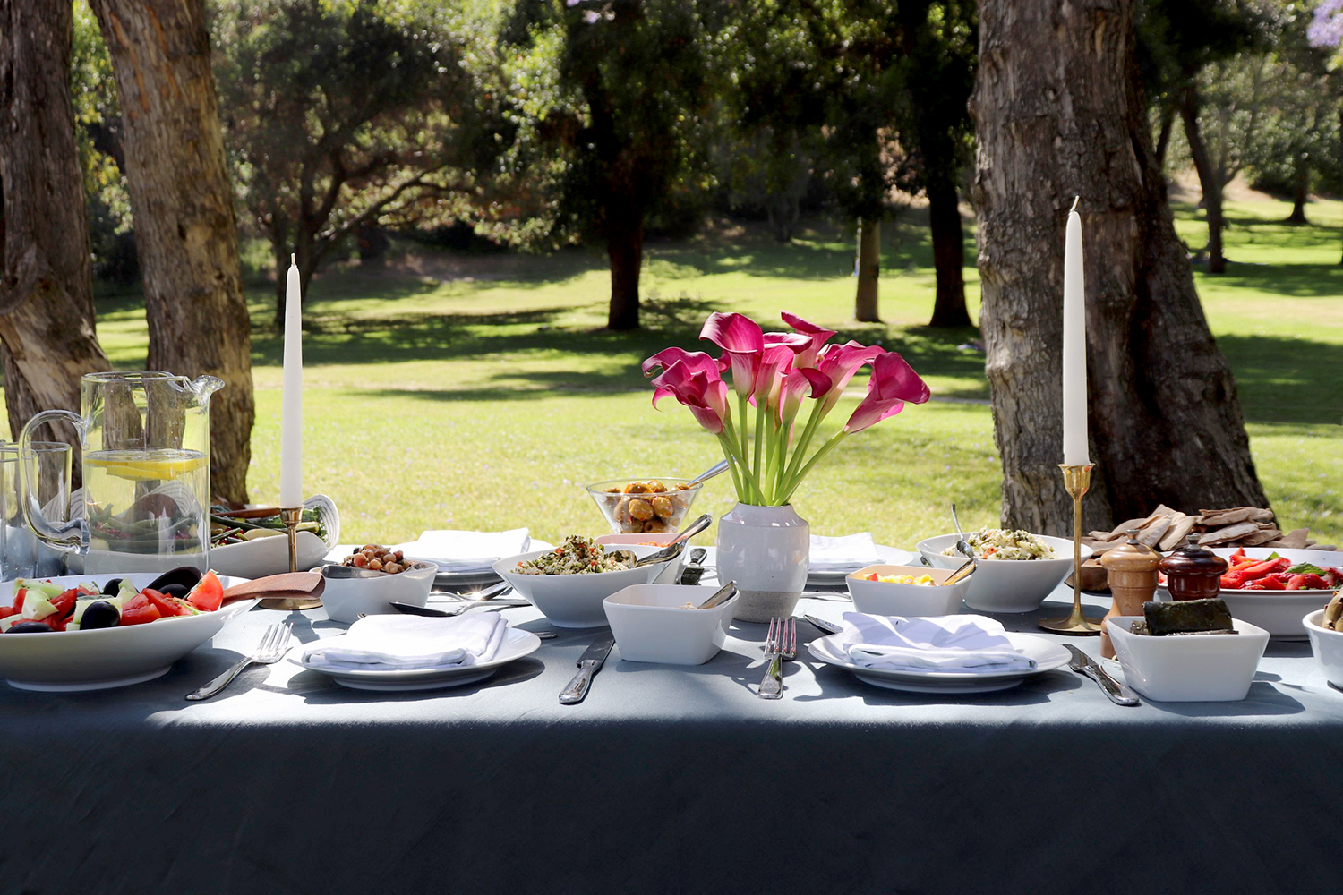Outdoor dining that's big on style and flavor - petrol dark forest green linen tablecloth from Huddleson