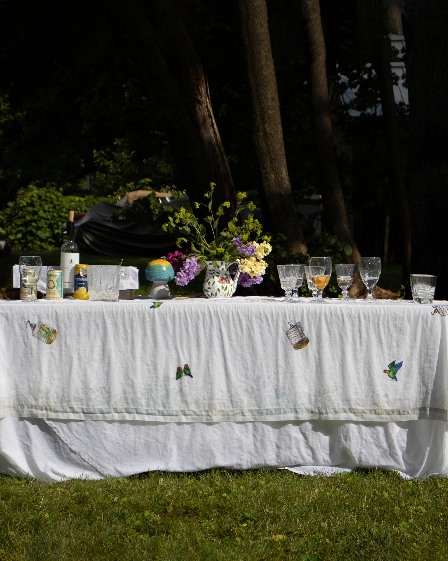 Lovebirds white rectangular linen tablecloth outdoors 