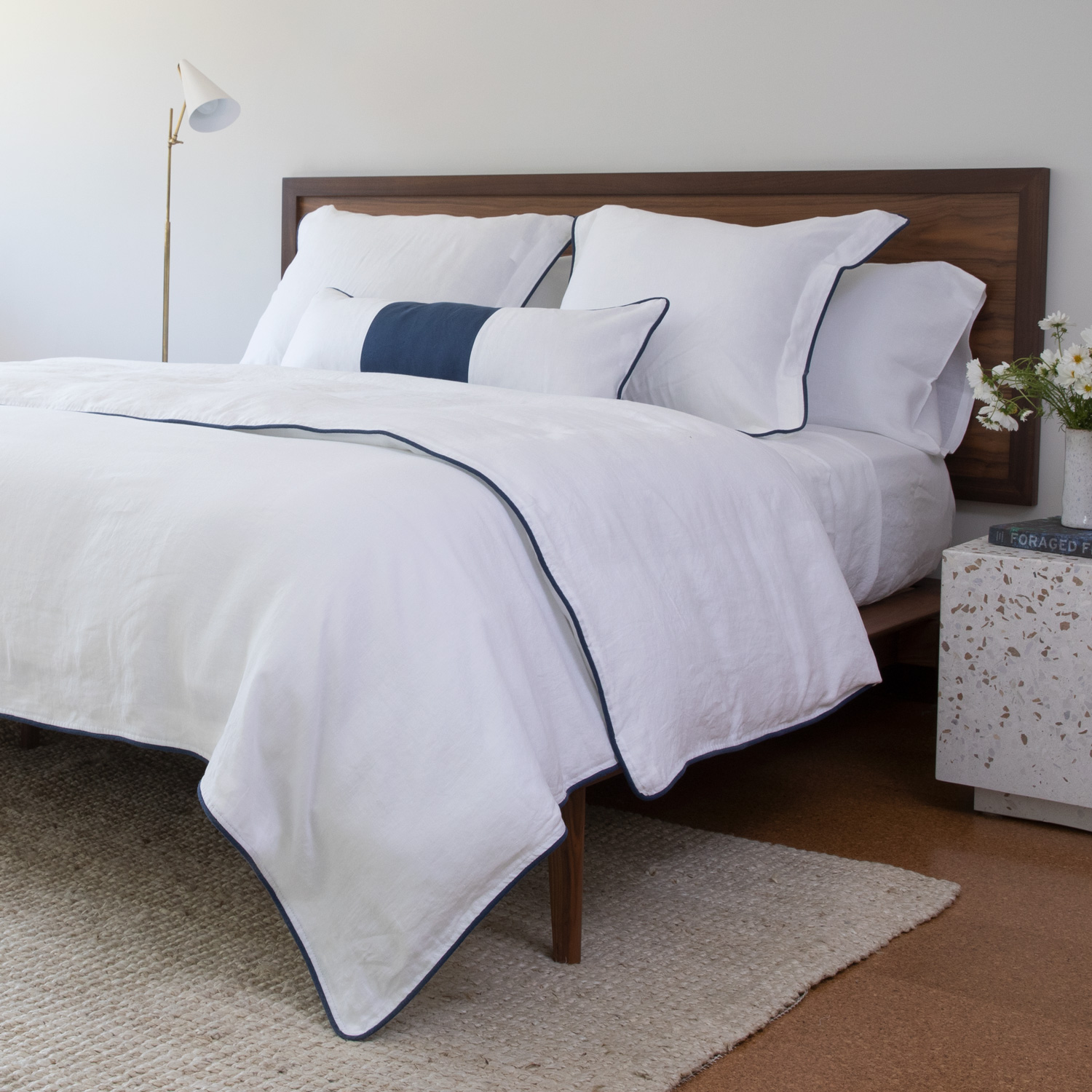 Blue and white linen duvet cover piping