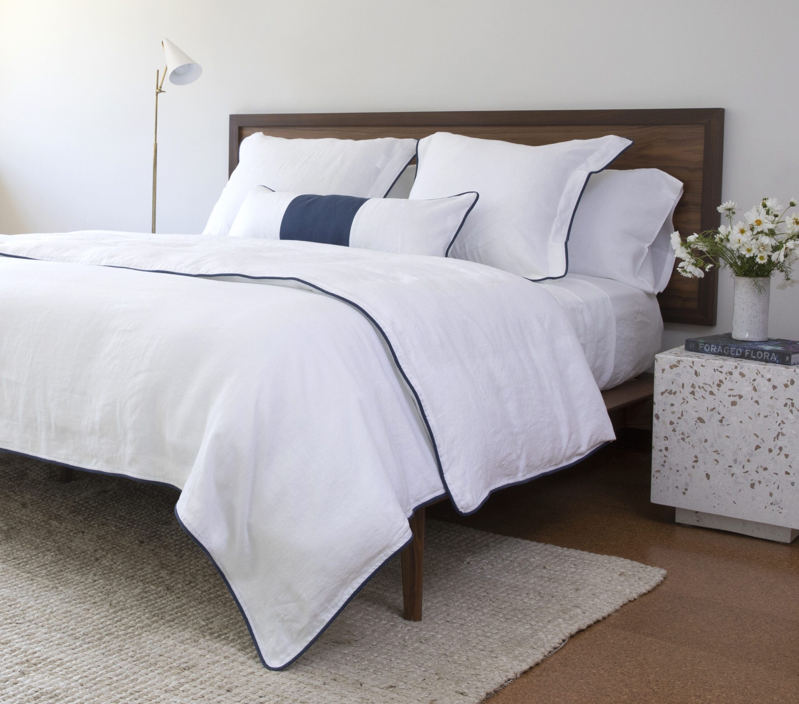 Blue and white piped bedding