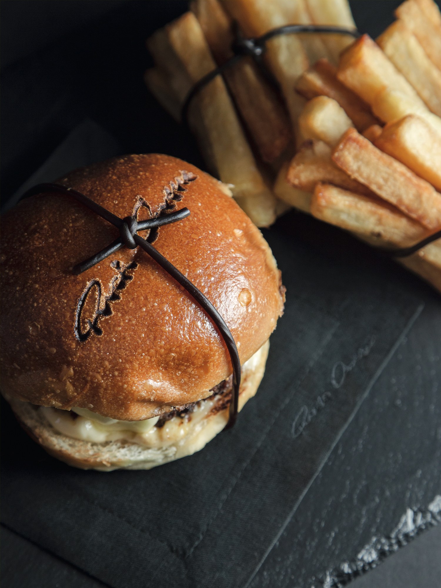 Monogrammed black linen cocktail napkin 
